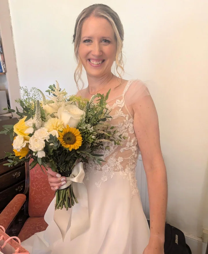 Chloe on her wedding day, with bridal hair by Becky